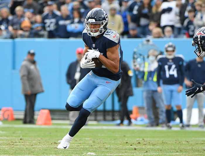 Tennessee Titans wide receiver Nick Westbrook-Ikhine (15) runs after the catch against the Houston Texans during the first half at Nissan Stadium.